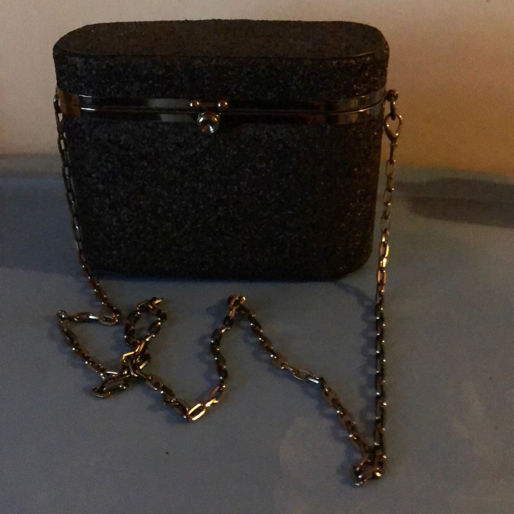 A Black Day GlitterOval Box Miuaudiere Clutch.